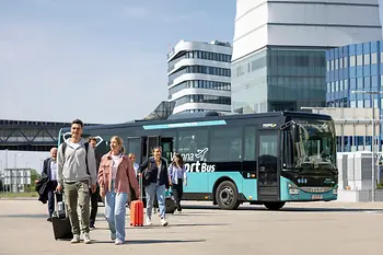 Passengers disembarking from the Vienna Airport Bus
