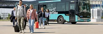 Passengers disembarking from the Vienna Airport Bus