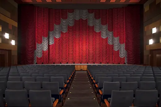Cinema hall empty with closed curtain
