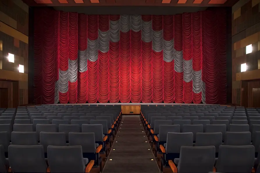 Cinema hall empty with closed curtain