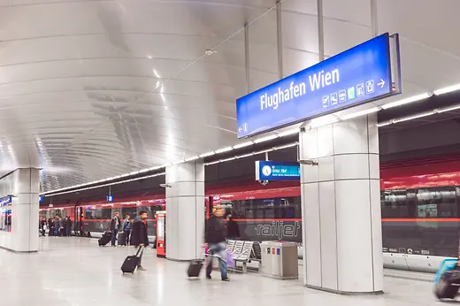 Railjet Express Train in the Vienna Airport Train Station with travelers