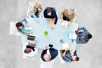 Group of people at conference table