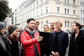 Person shows group a tablet