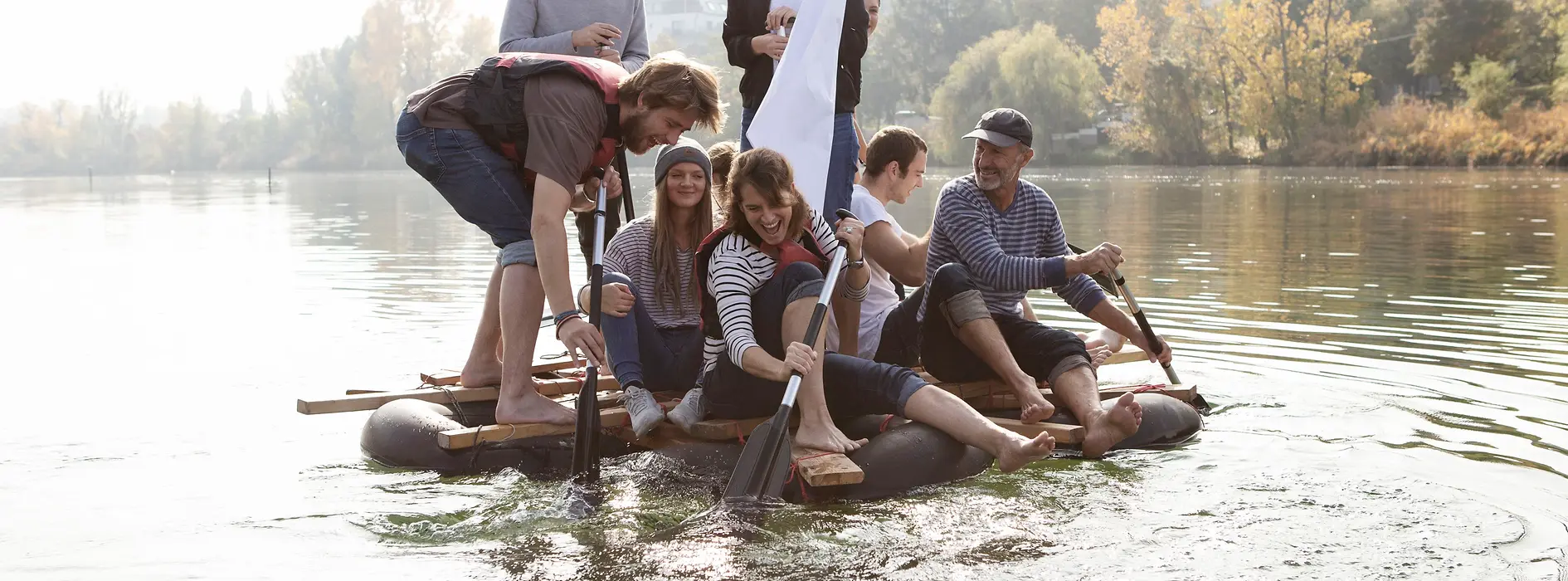 Group on raft in water