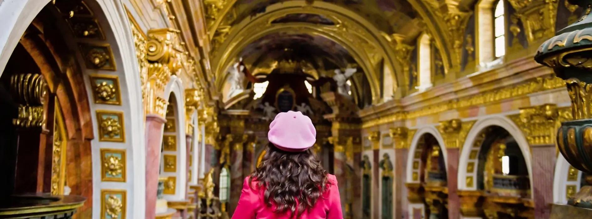 Woman from behind inside a church