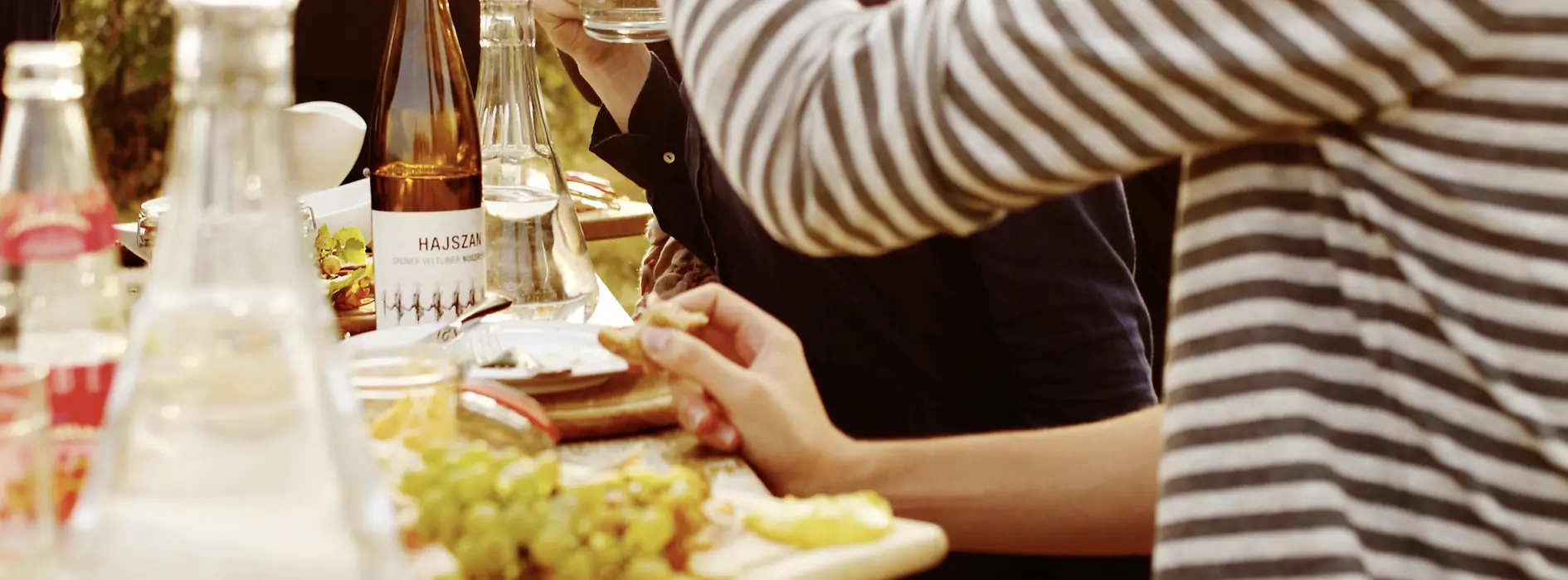 Group at table with food and drinks