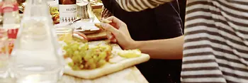 Group at table with food and drinks