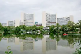 The buildings of the Vienna International Centre seen from across the Old Danube