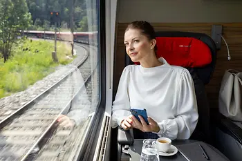 Business travellers on ÖBB train