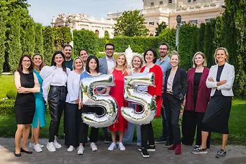 Photo of the Vienna Convention Bureau team, celebrating their 55th anniversary