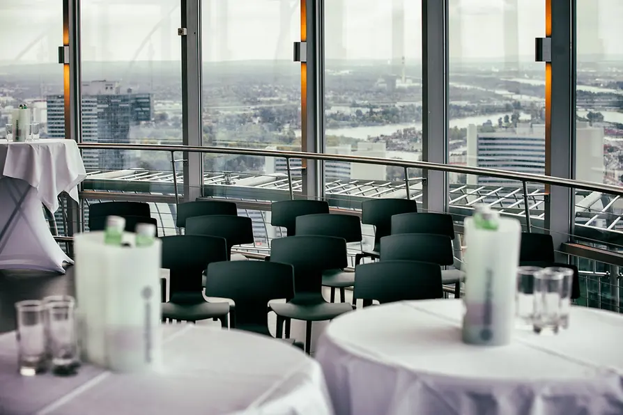 Donauturm Innenterrasse with seating and cocktail tables